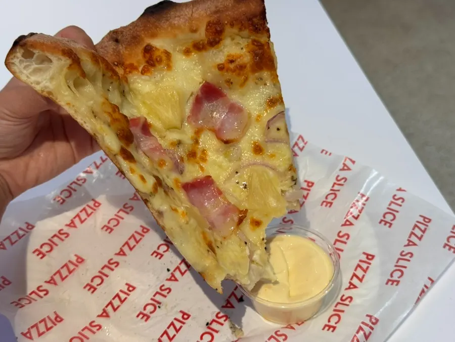 Slice dipped in garlic dipping sauce