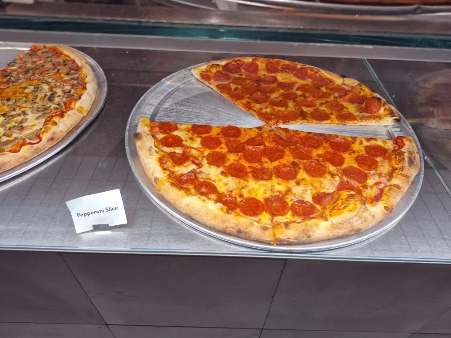 Close-up of the displayed slice pizzas