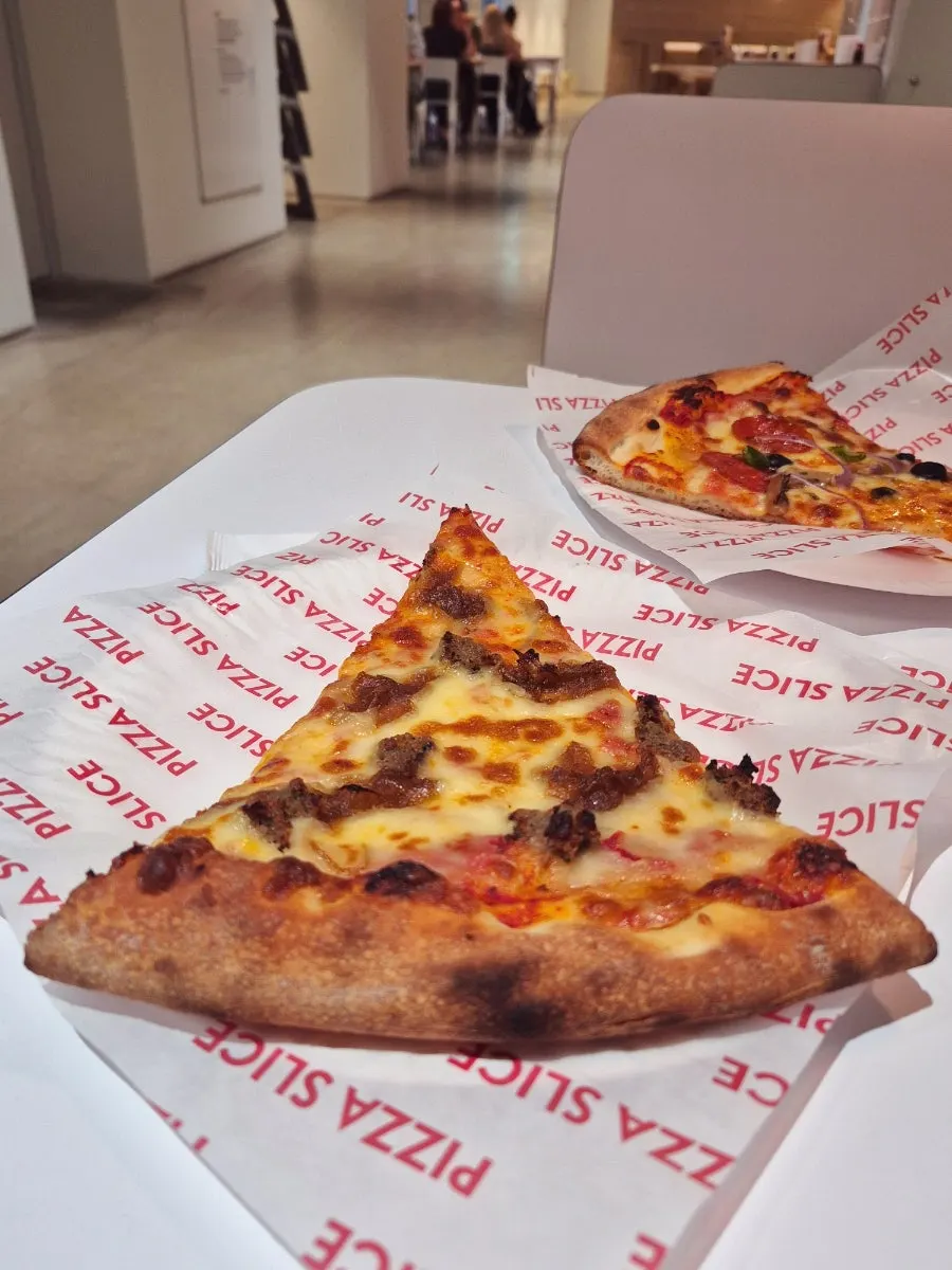 Close-up of the meatball-topped slice