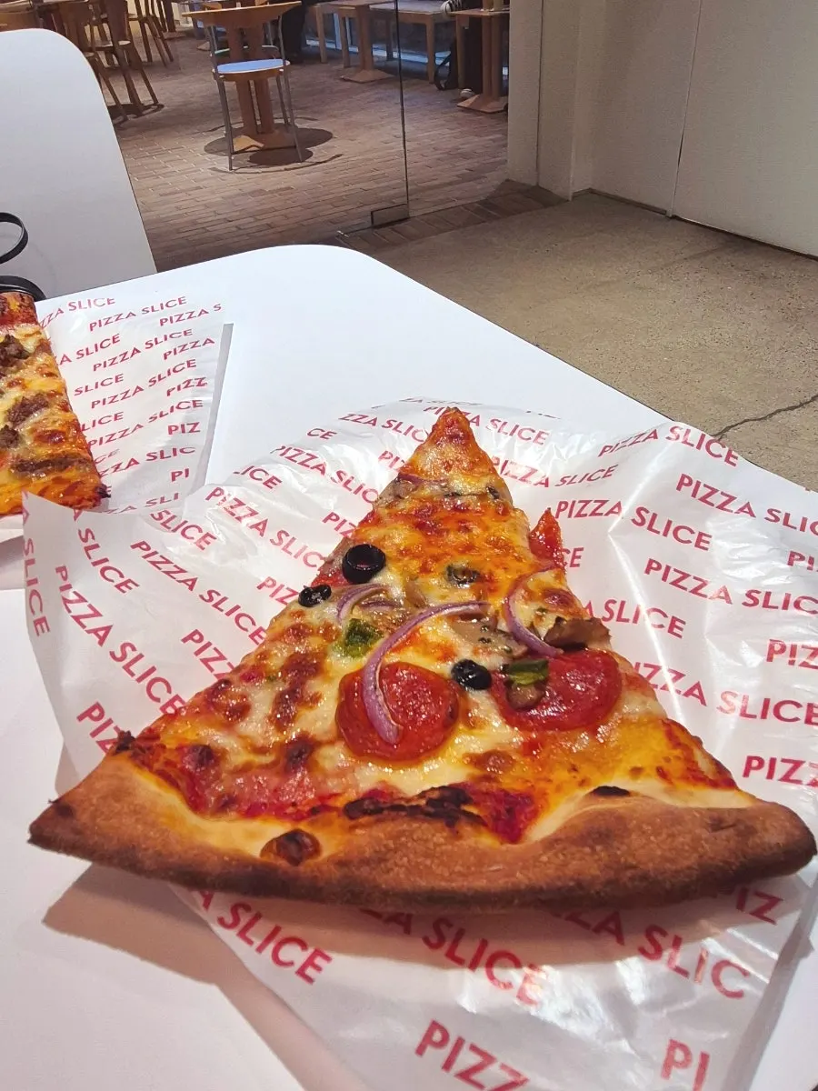 A slice with a bite taken out of it