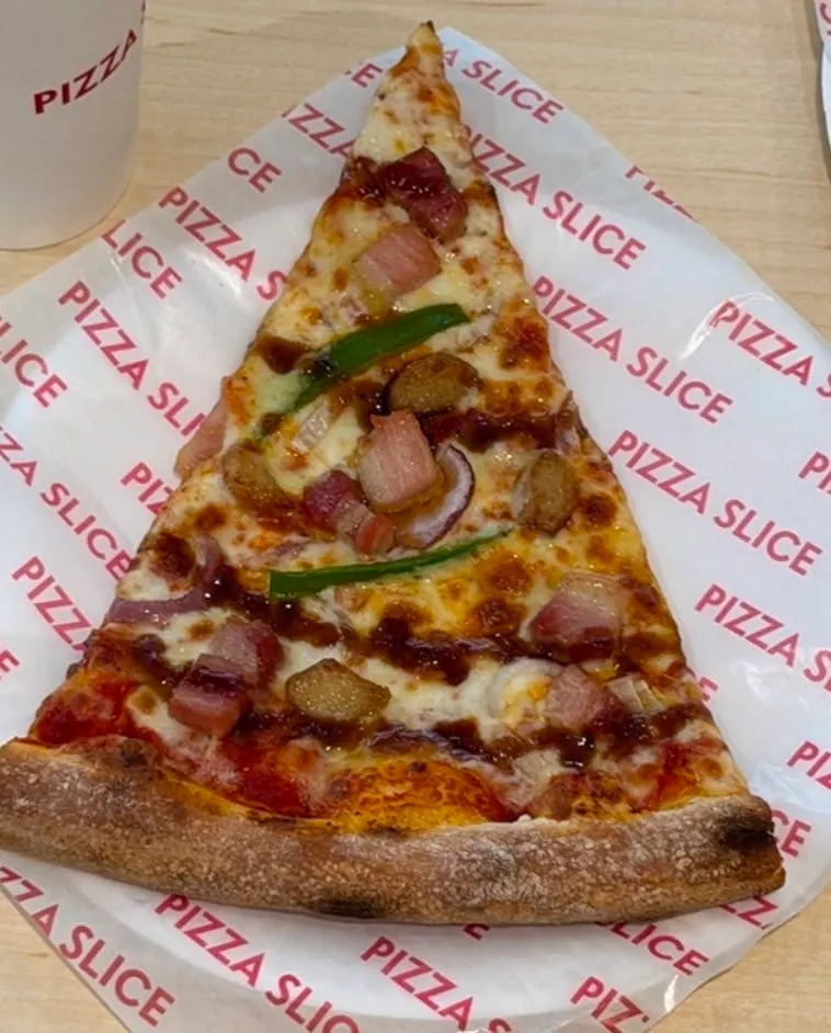 Sign for Tokyo original brand Pizza Slice Seoul