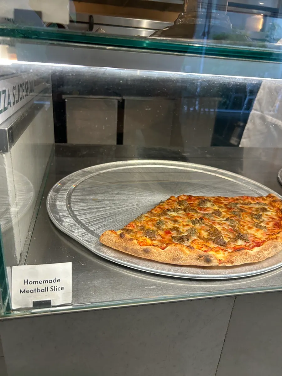 A slice of the Cheese Slice pizza