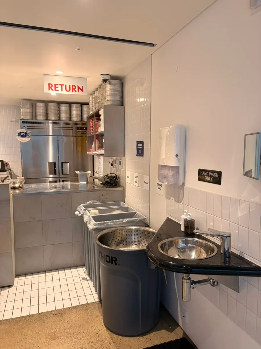 Kitchen prep counter with stainless steel refrigerators