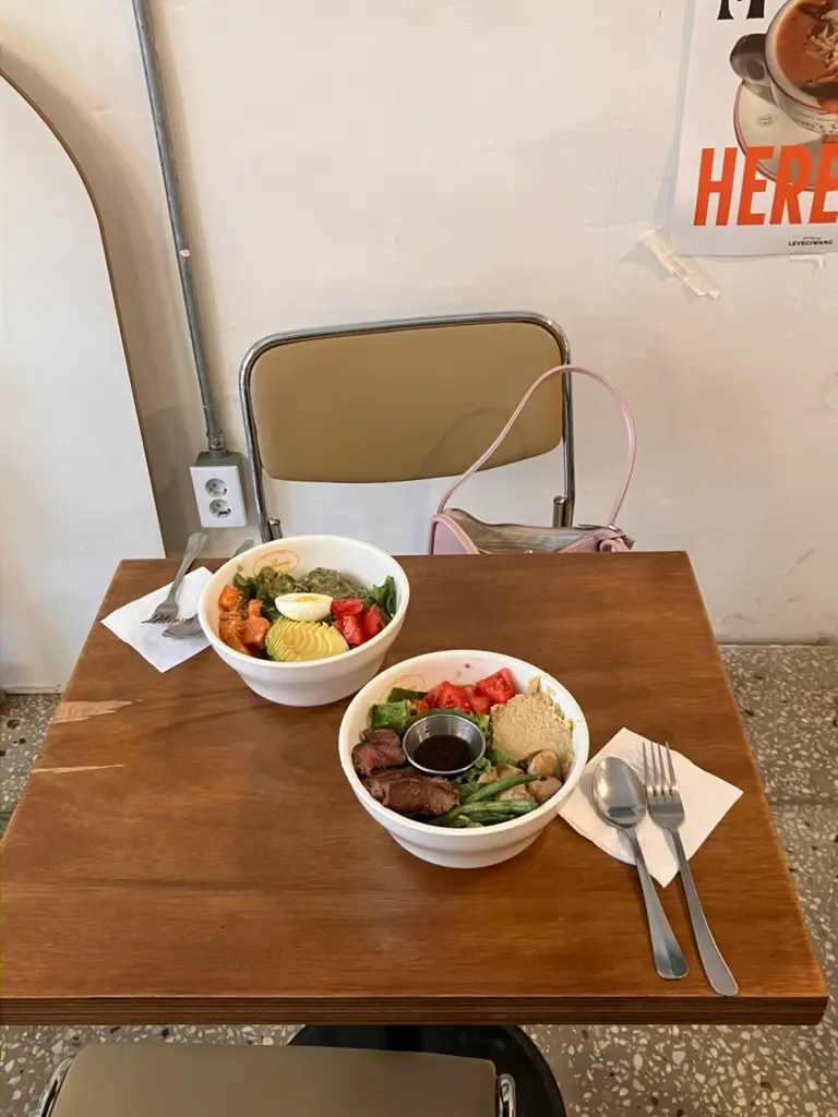 Steak Bowl topped with steak and hummus