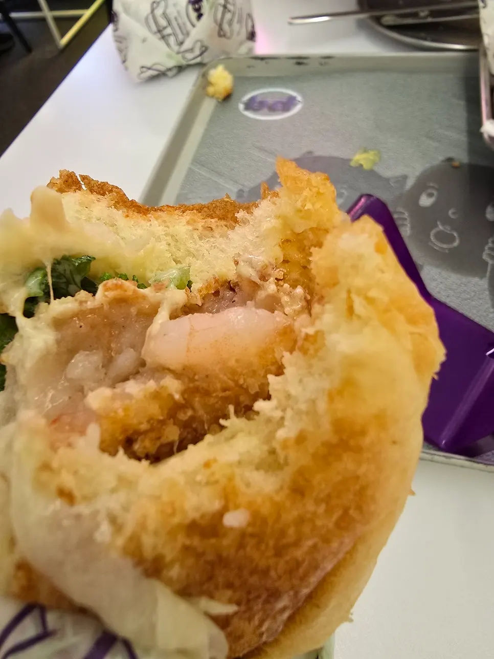 Shrimp burger with wasabi sauce and vegetables