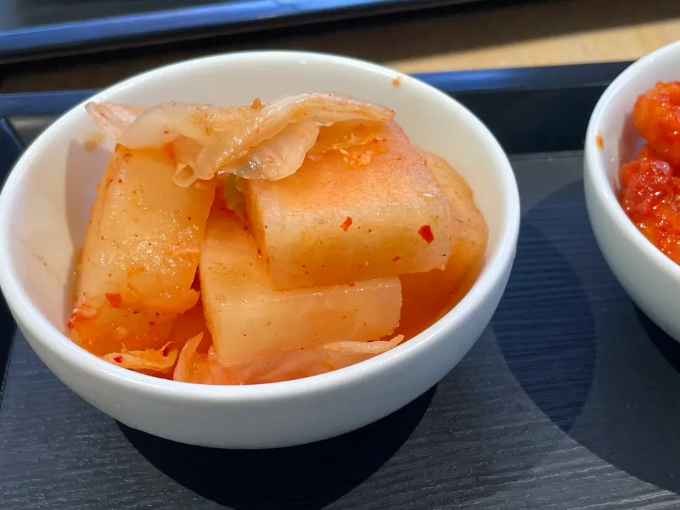 A piece of gomtang meat with pickled pepper