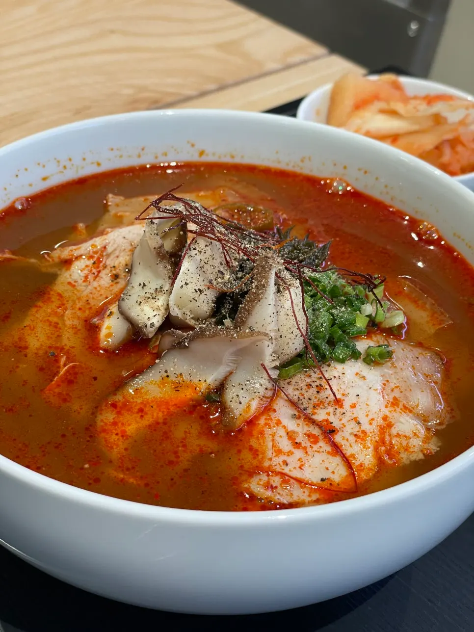 Spicy pork gomtang set topped with tot seaweed