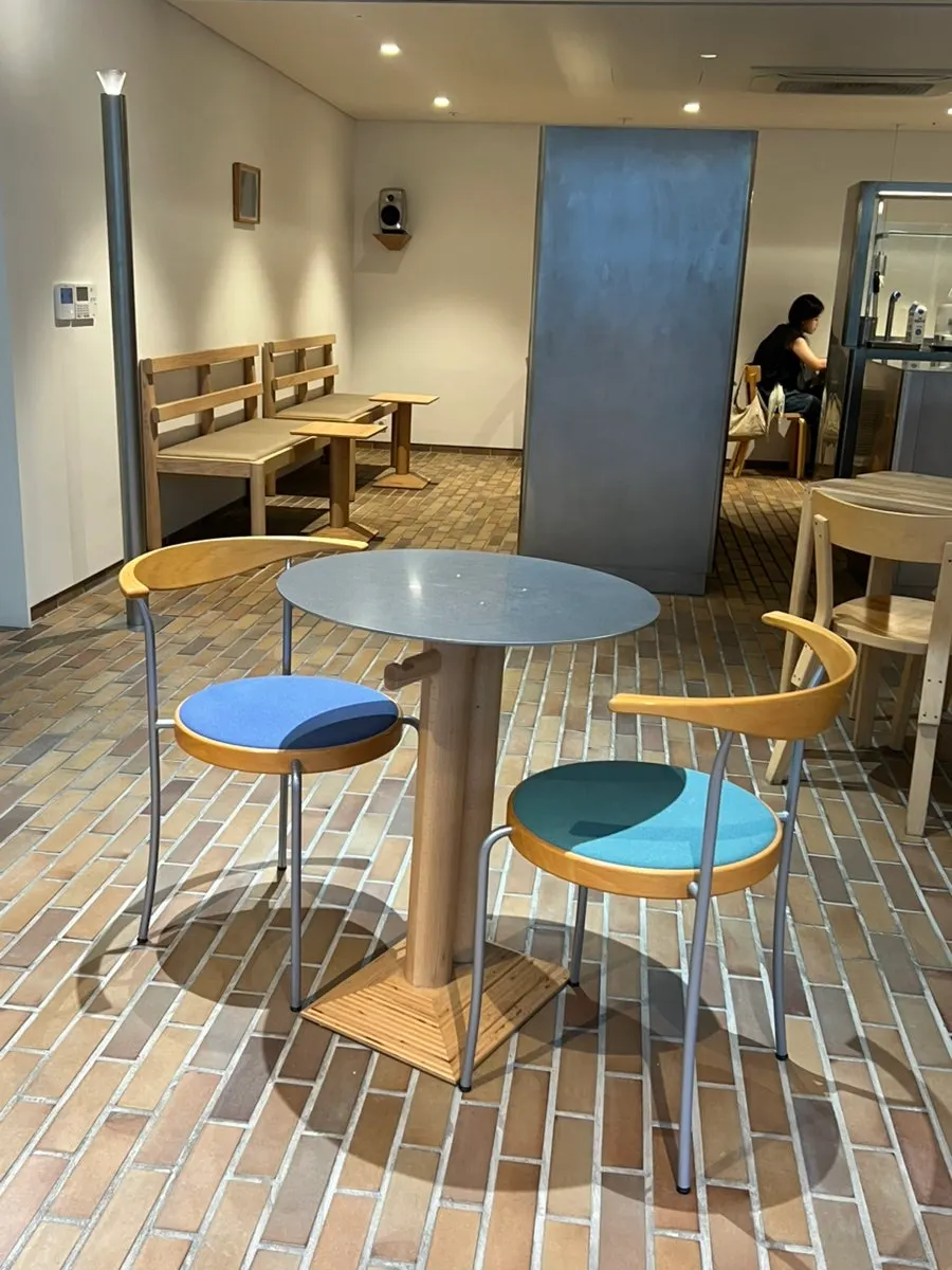 Furniture layout and seating area at T Coffee