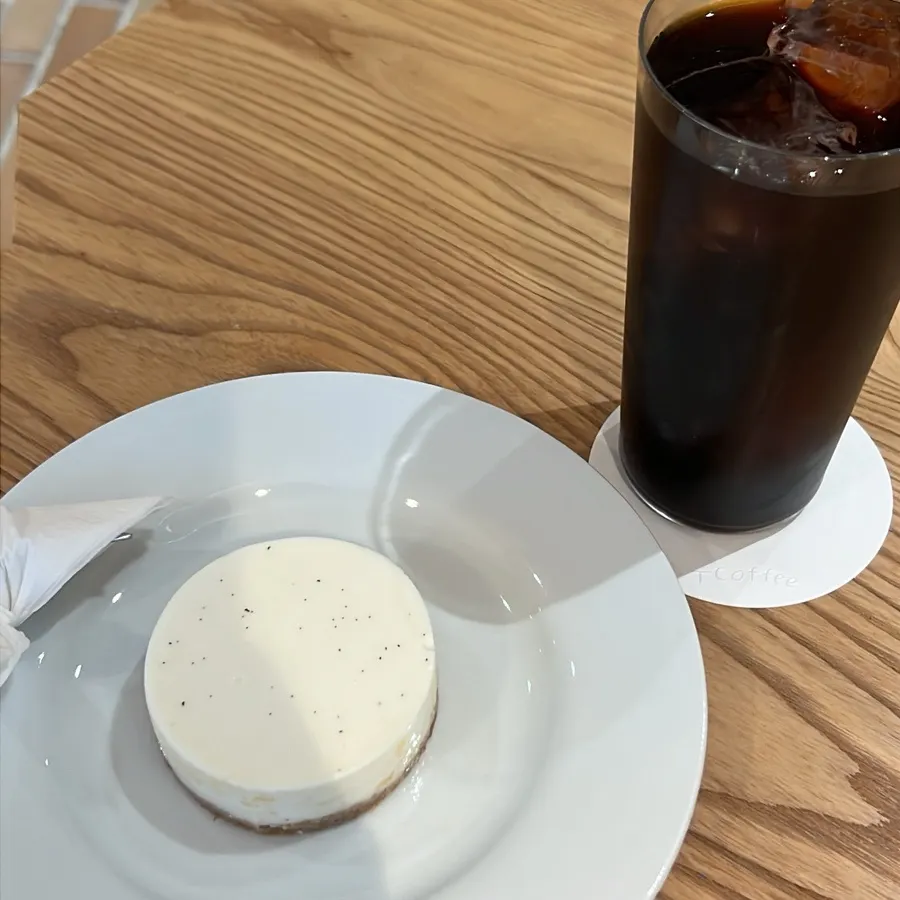 T Coffee's cheesecake and cold brew set on the table
