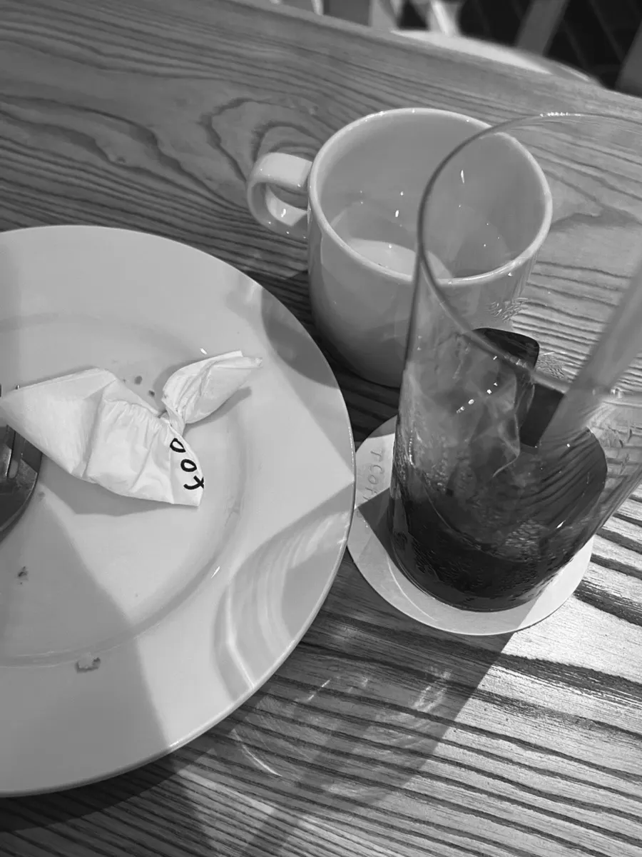 Table after finishing the cheesecake and cold brew