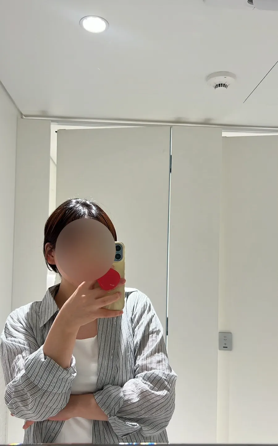 Mirror in T Coffee's bathroom with pretty lighting