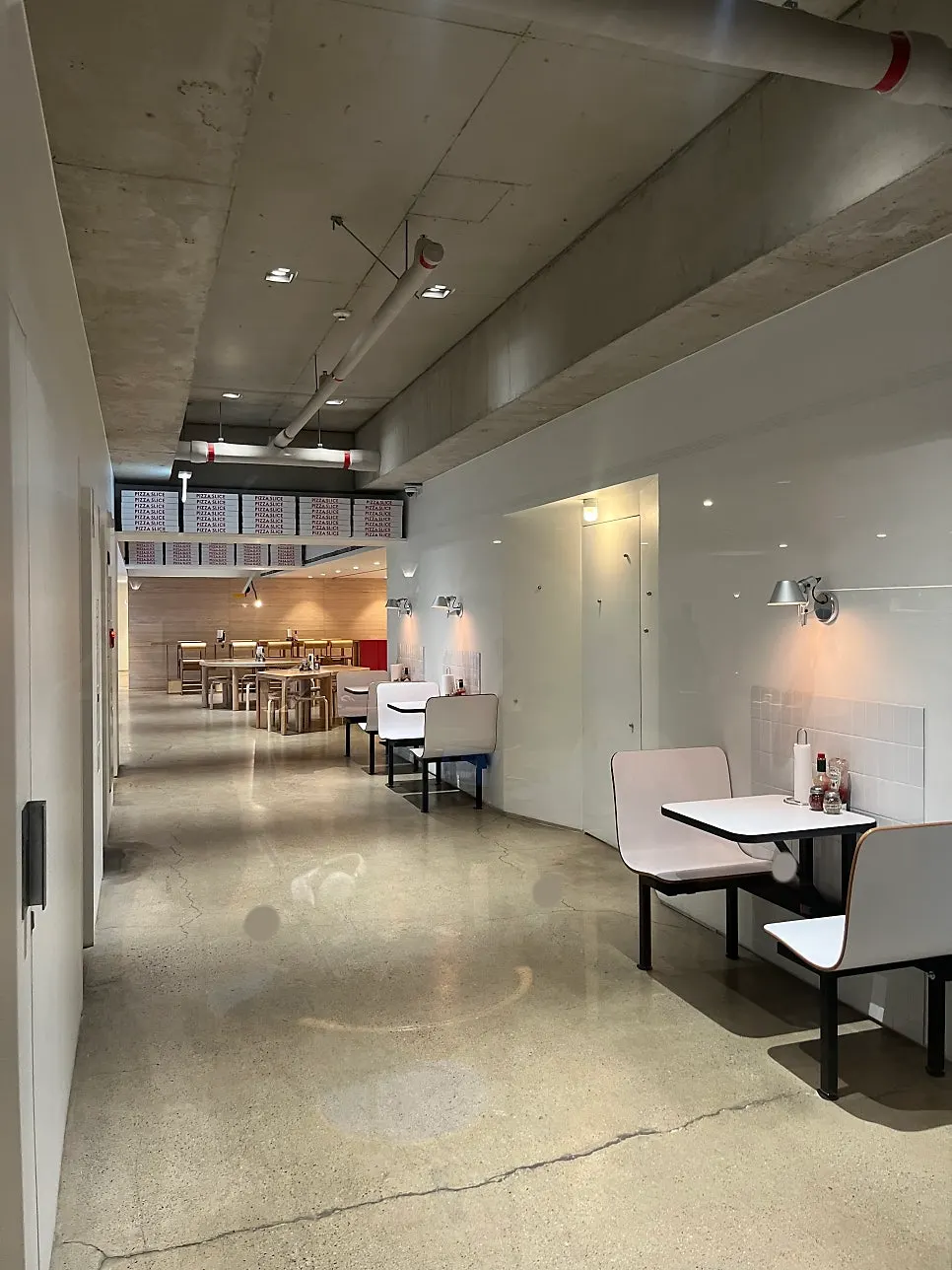 Passage inside the café connecting to the Pizza Slice store