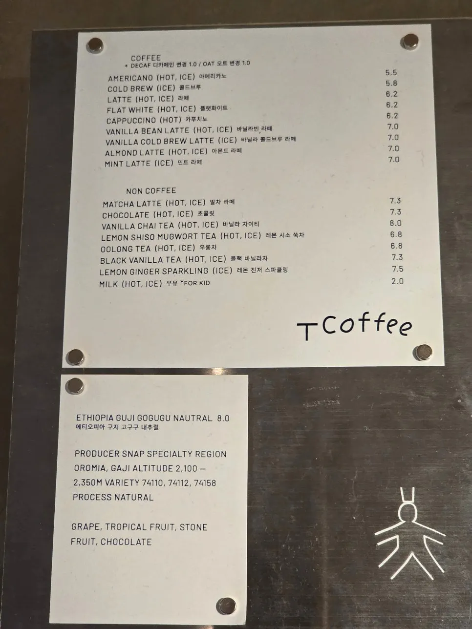 T Coffee's menu board and prices