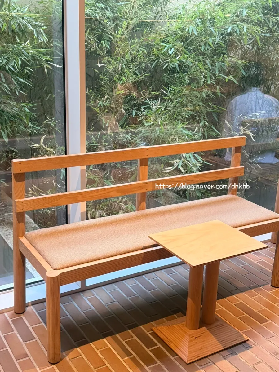 Sunlit seats by T Coffee's floor-to-ceiling window