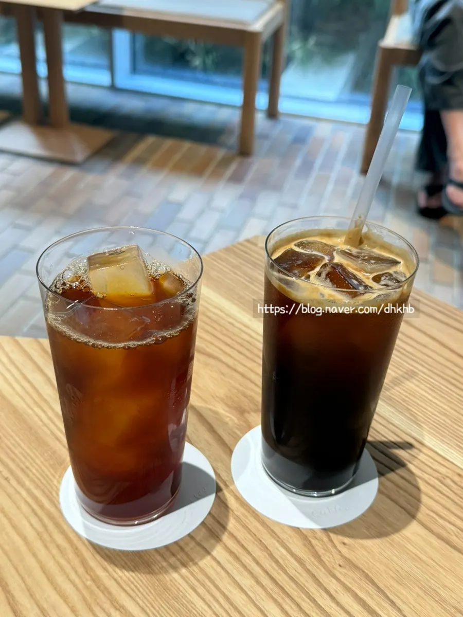 An iced americano from T Coffee on the table