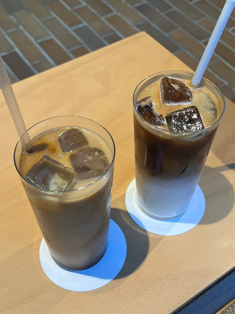 Two coffees moved to a brighter table