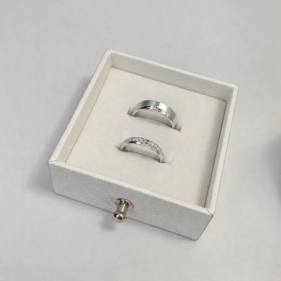 Close-up of the finished AXIS couple rings