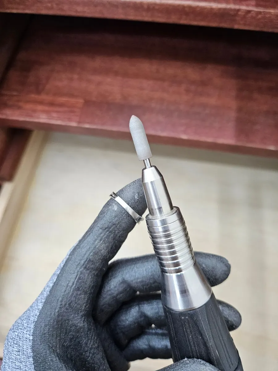 Couple focused on shaping their rings