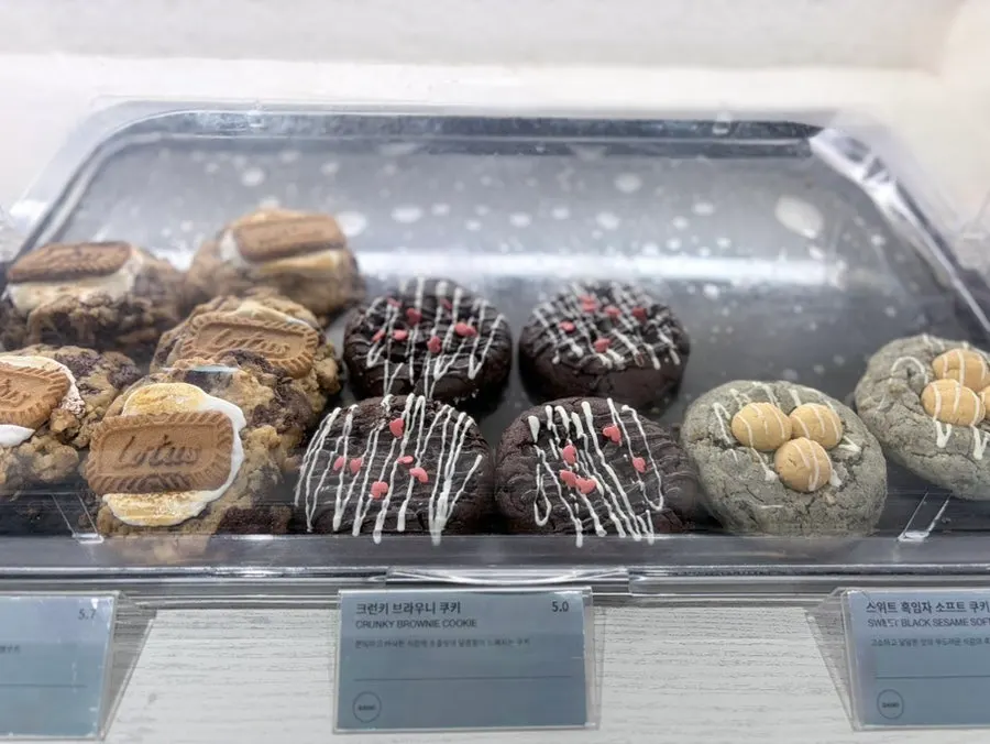 Bakery display case with bread laid out at noon