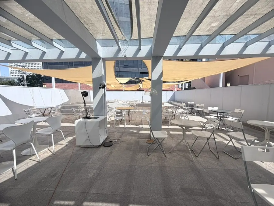 Second floor interior of LOOOP Bakery with many seats