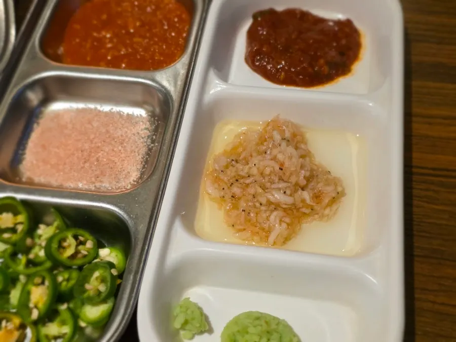 Plate of hairtail jeotgal and garlic salted shrimp sauces
