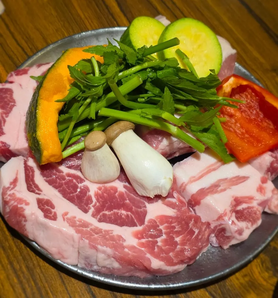 Thick pork belly and premium pork neck on the grill