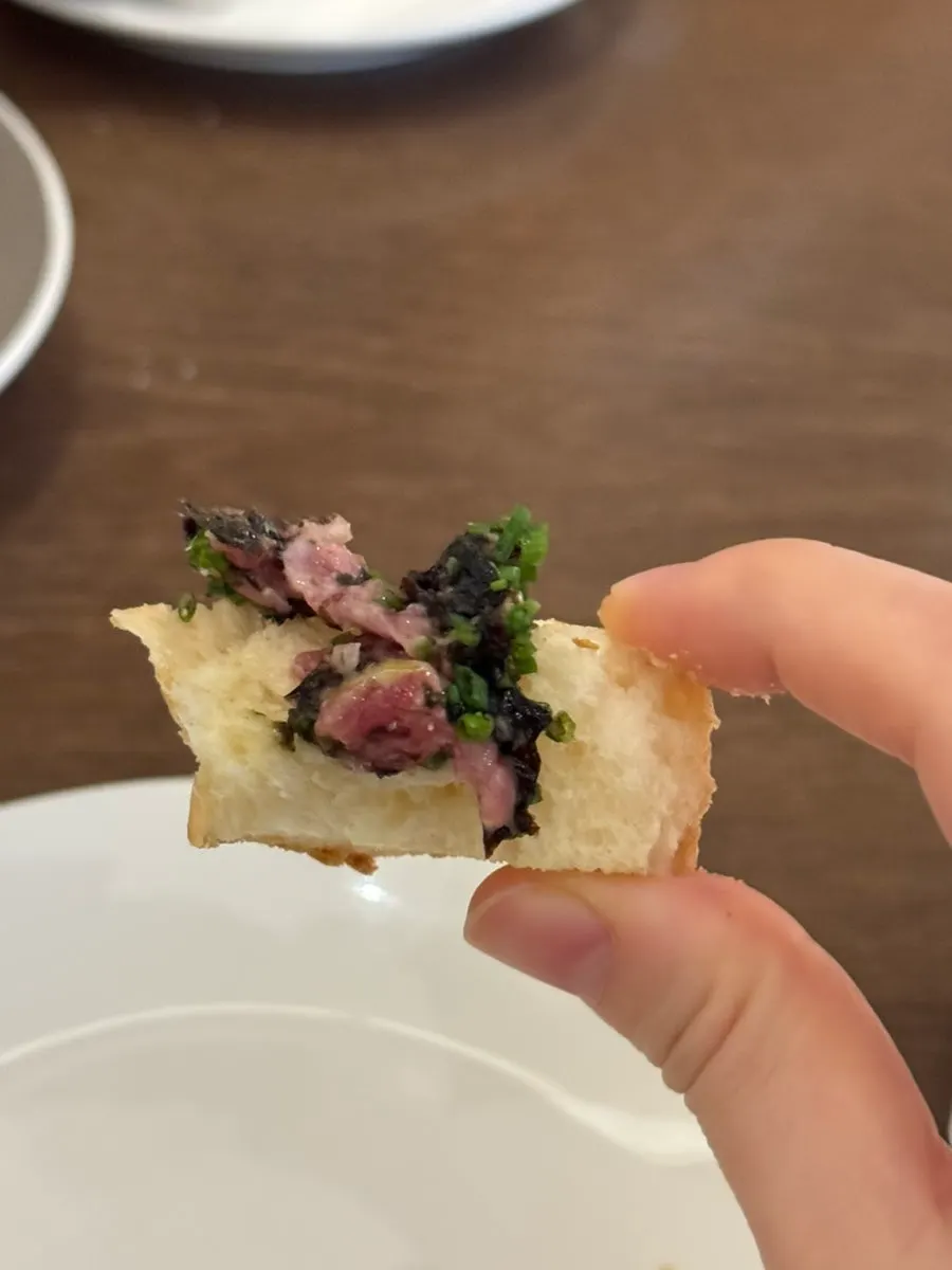 Beef tartare and laver pesto served on brioche bread