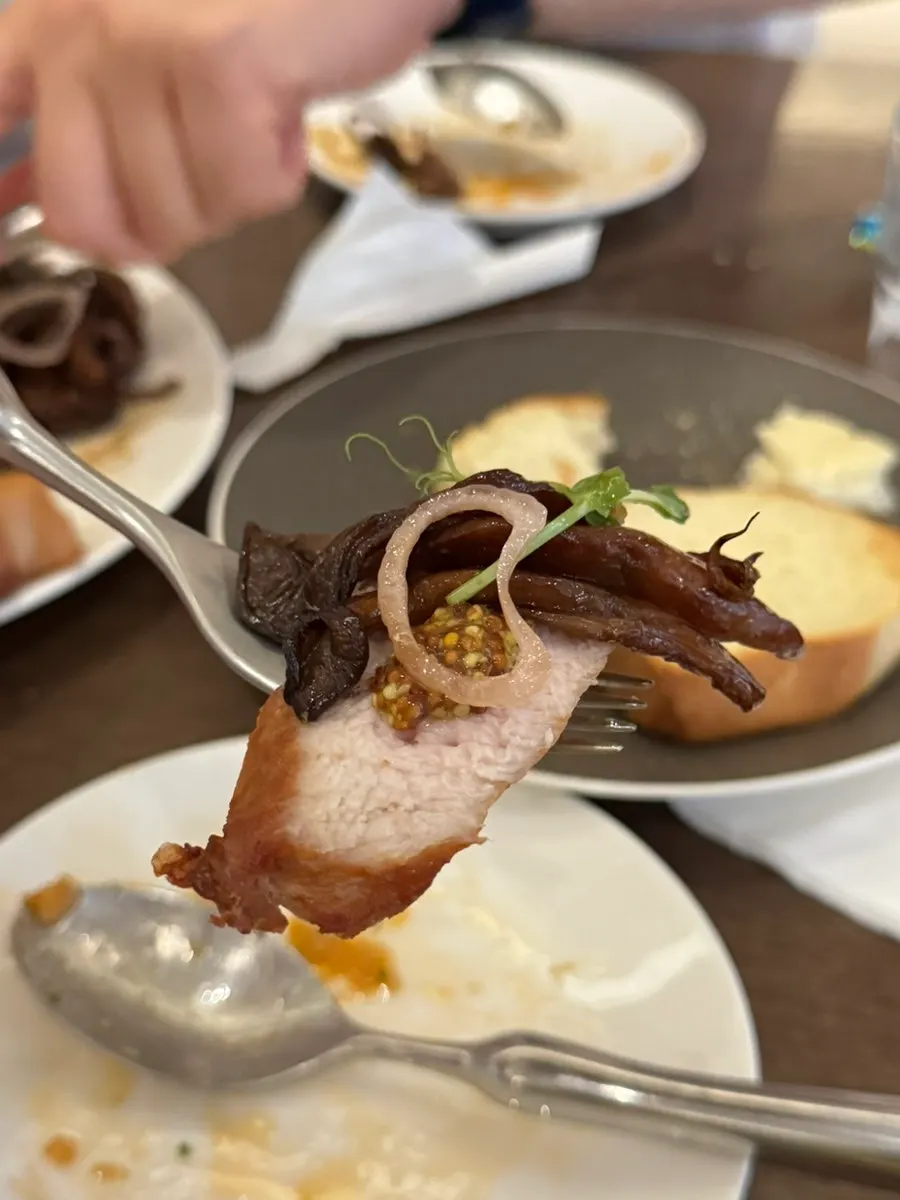 French rack served with soy-glazed sautéed oyster mushrooms