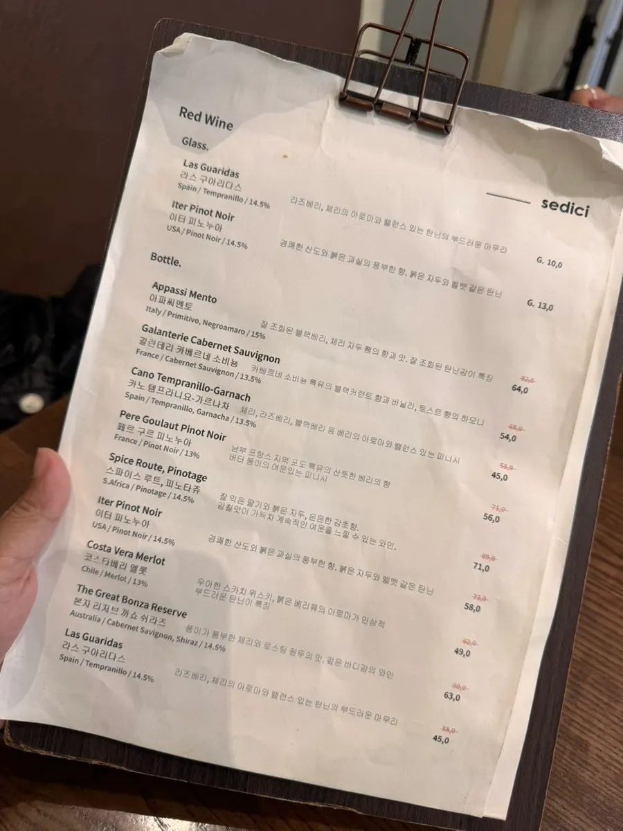 Ordering while looking over Sedici's menu