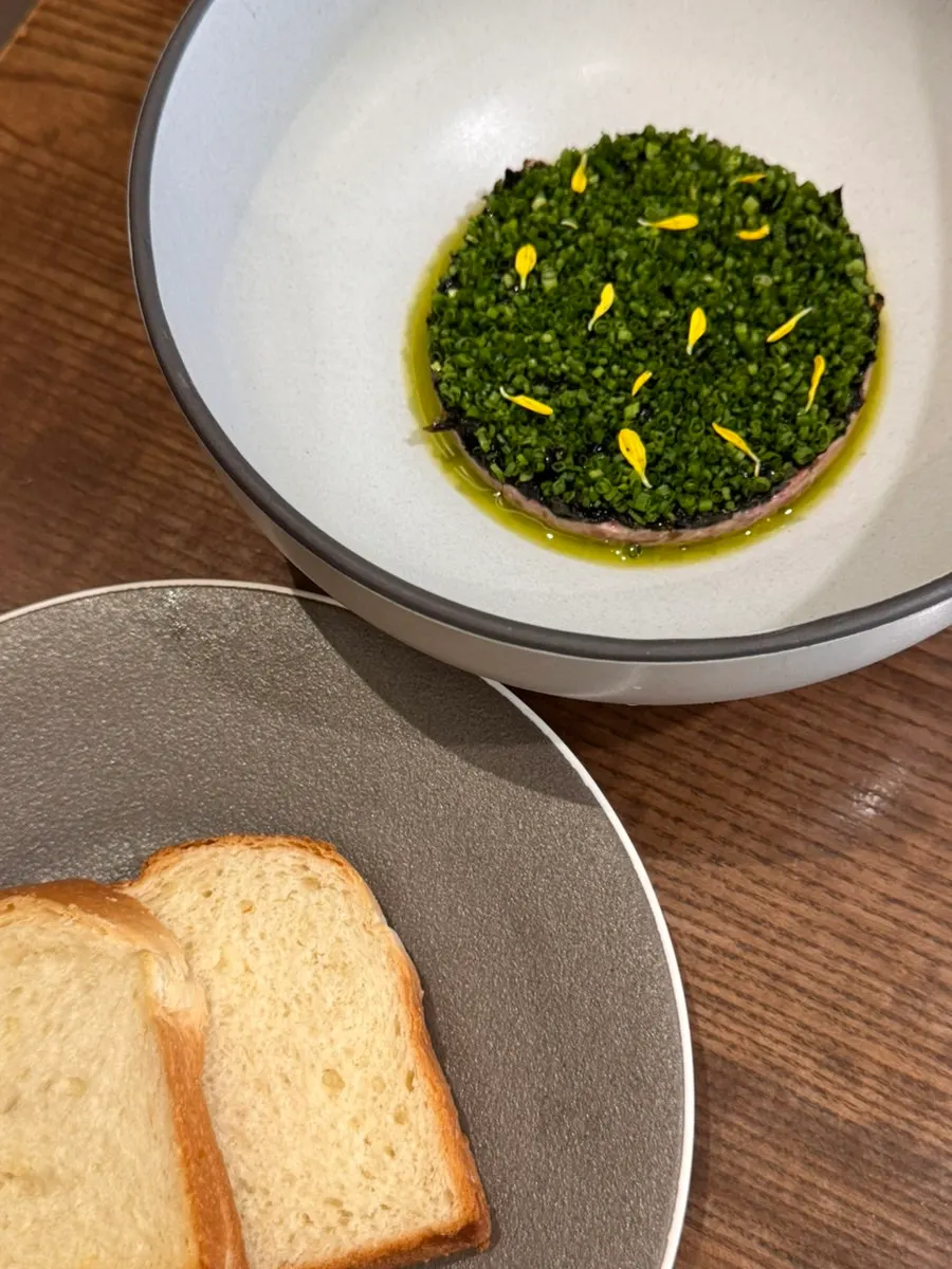 Sedici's beef tartare and brioche table setup