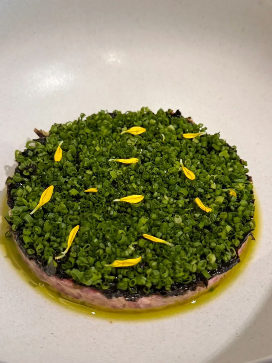 Sedici's beef tartare topped with kim pesto