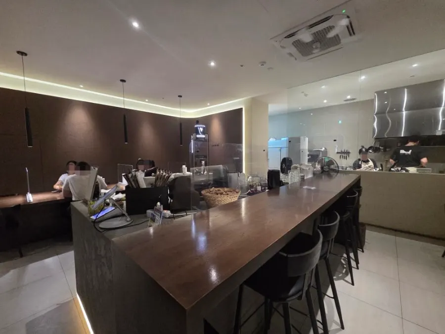 Sedici's bar table and dining area