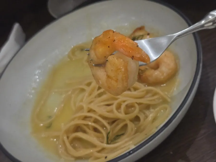 Butter-coated noodles and shrimp pasta