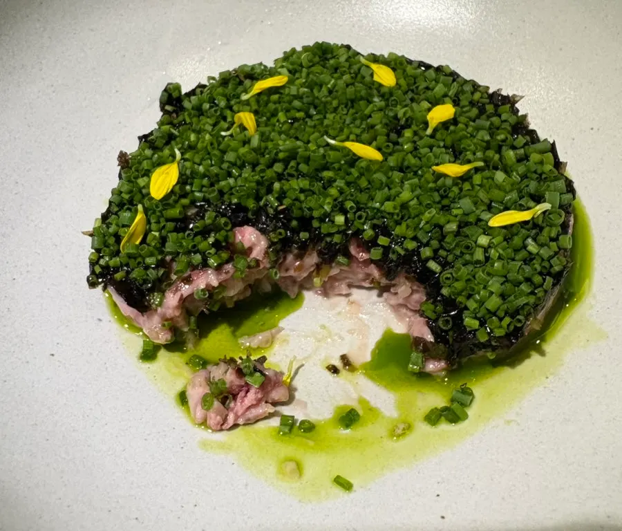 Beef tartare and brioche enjoyed as a starter