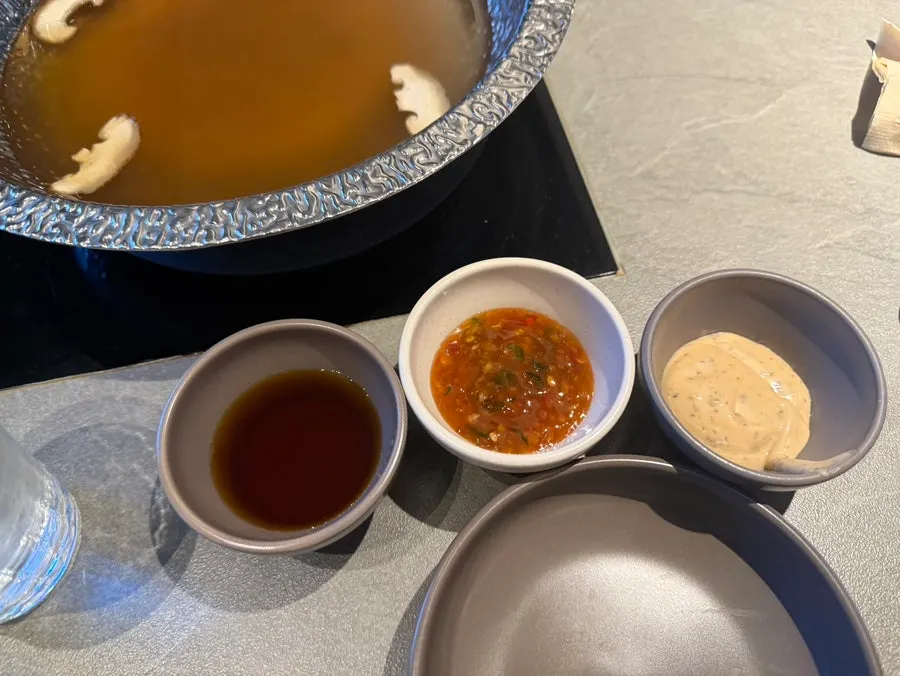 Yuzu ponzu, sweet chili, and sesame mayo sauces