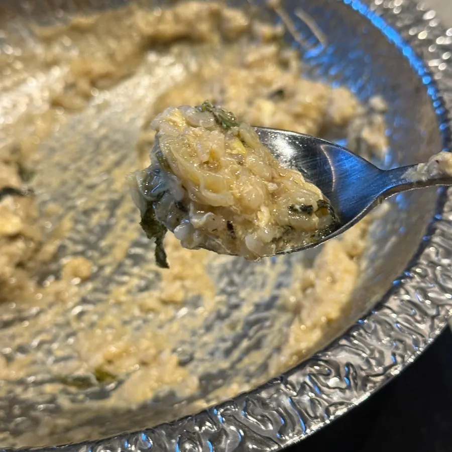 Hot egg porridge made with clear mushroom broth