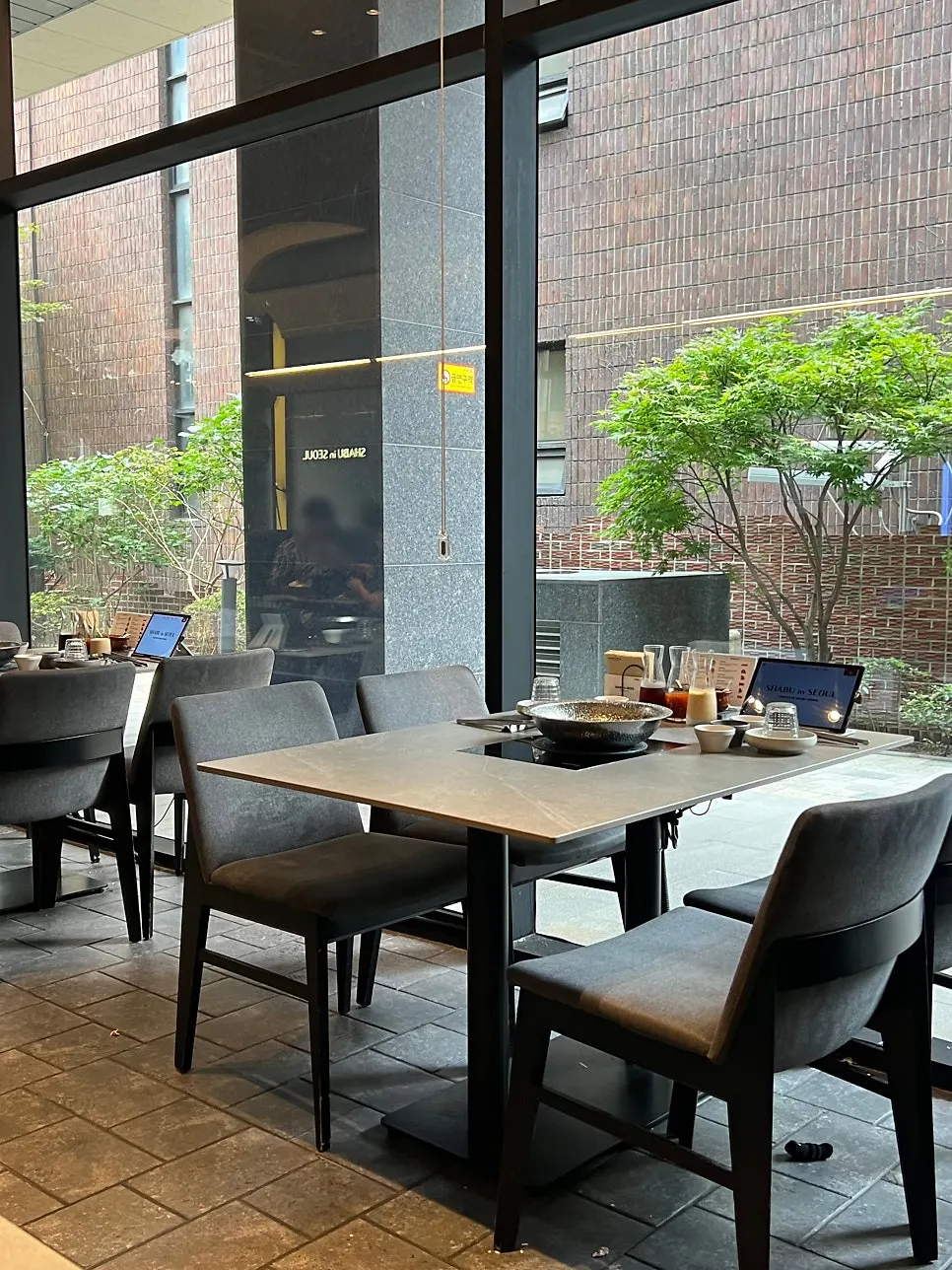 Sofa booth seating at Shabu in Seoul Seongsu