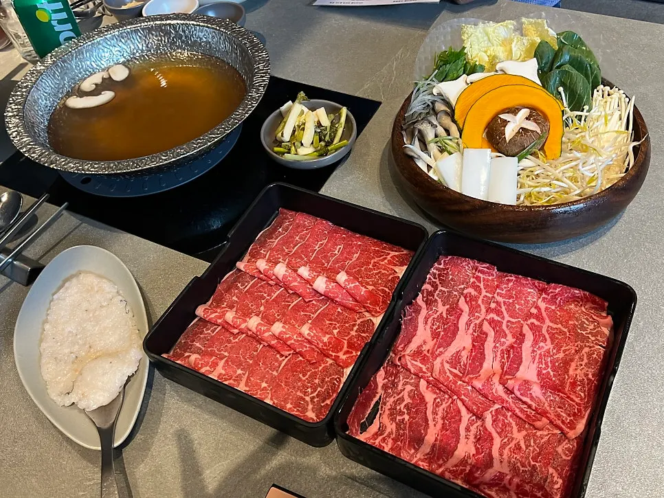 Table set up with the basic shabu set for two