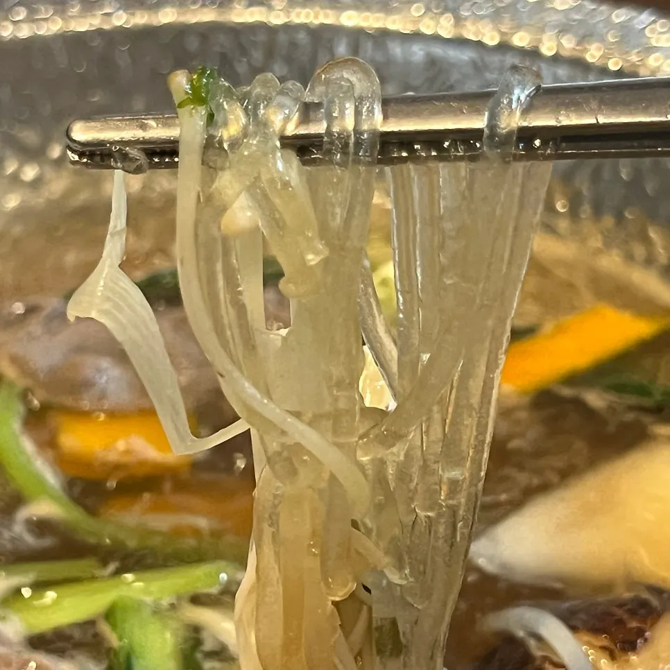 Meat and vegetables placed on rice paper for a wrap