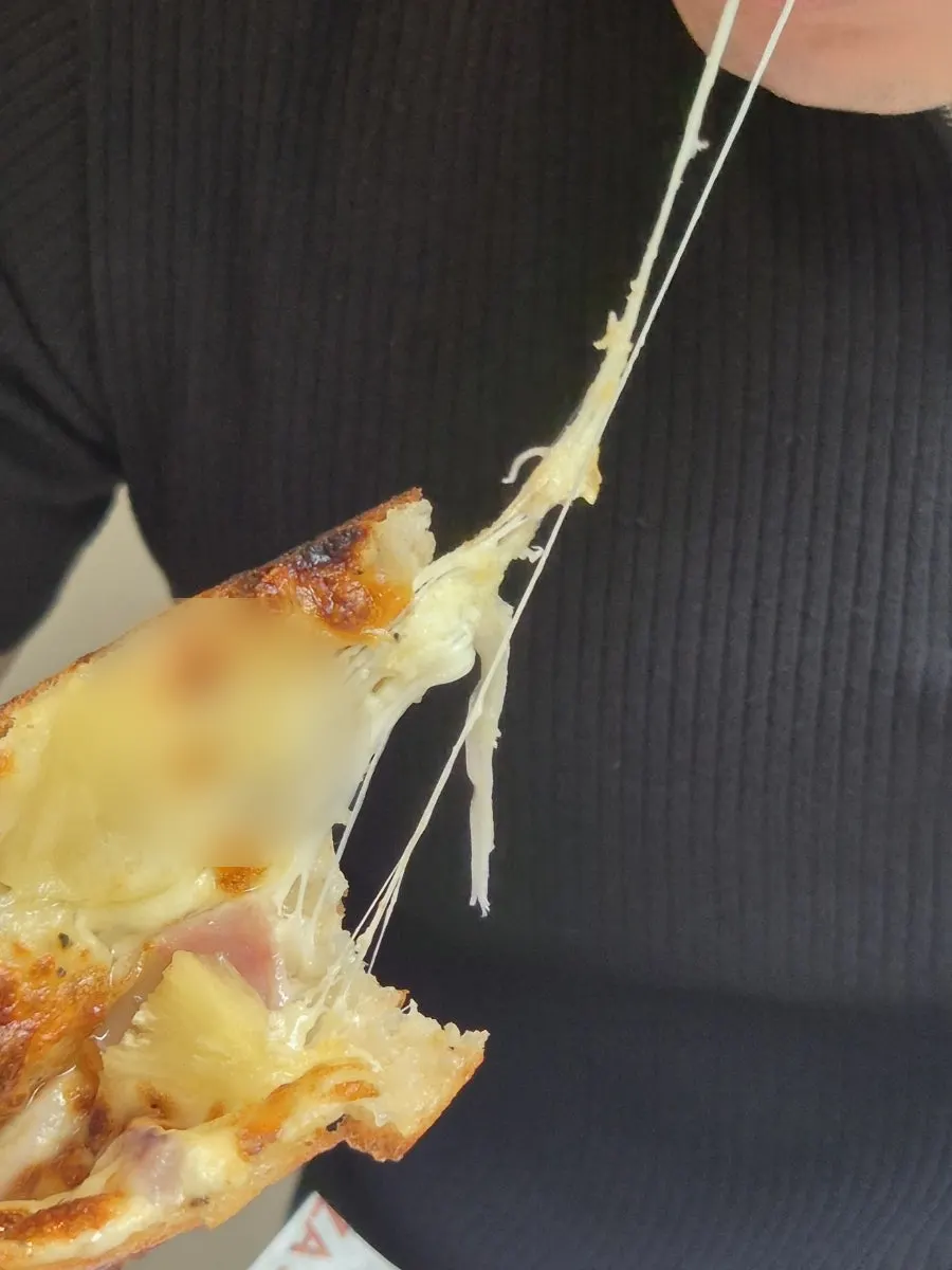 White Hawaiian slice topped with pineapple