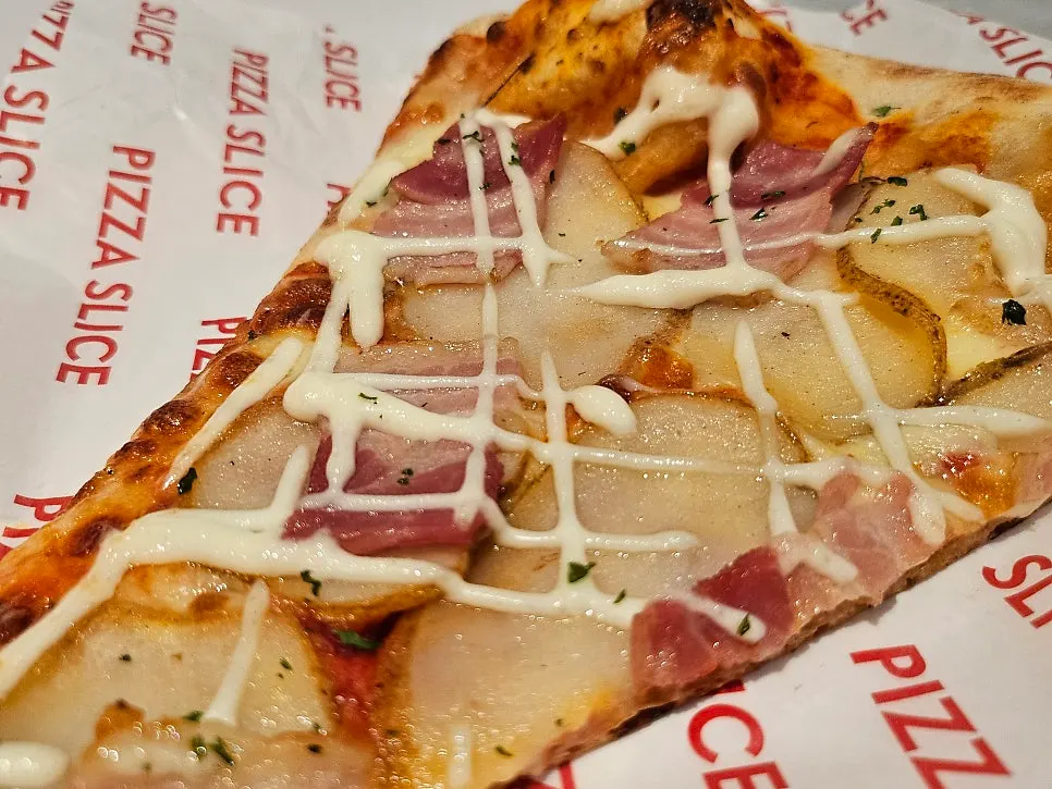 Close-up of the potato pizza slice