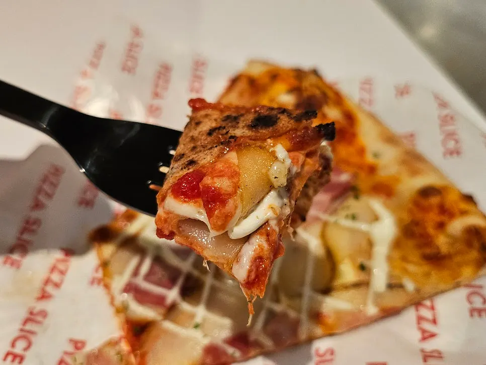 Cross-section of the thin-crust potato pizza slice