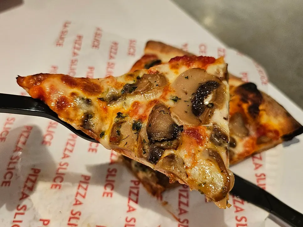 Close-up of the mushroom pizza toppings