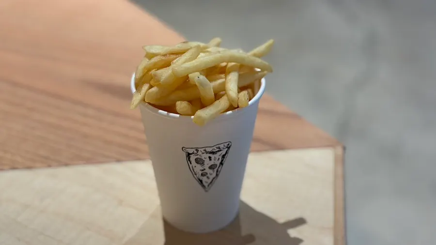 Fries served in a paper cup