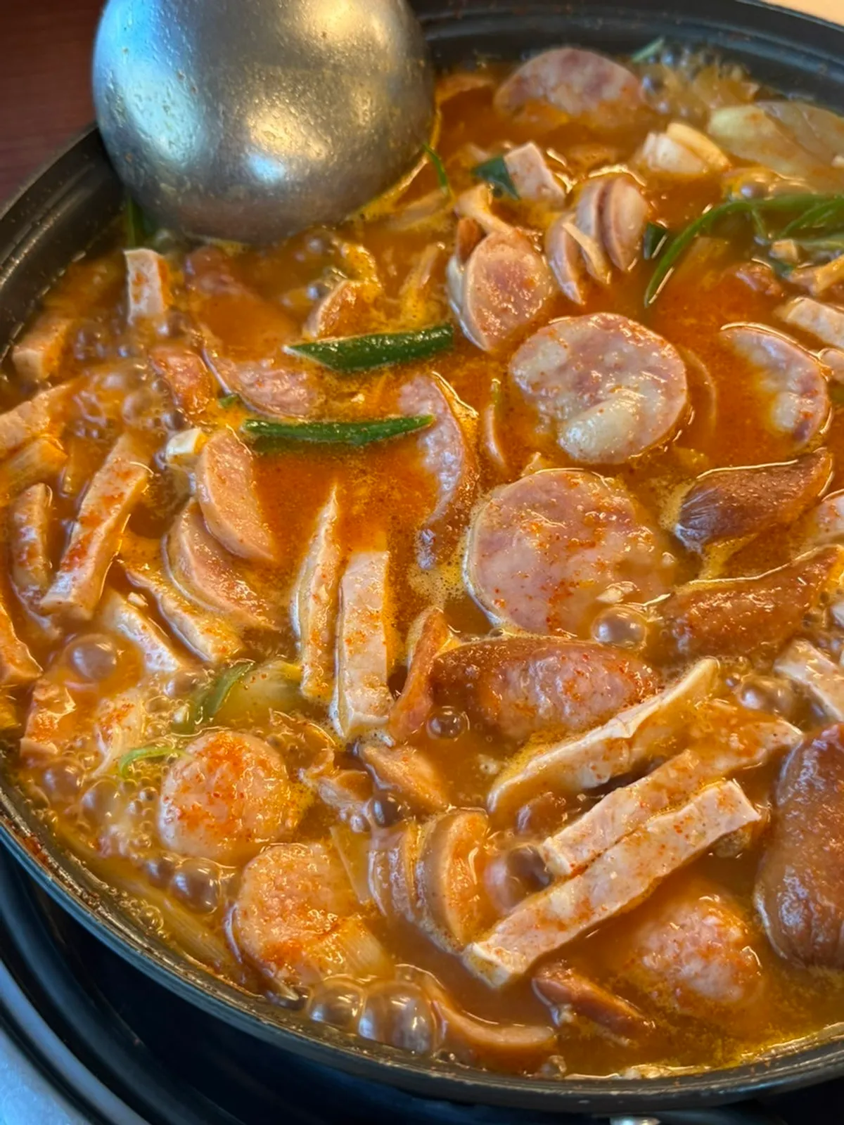 Sausage-bomb budae jjigae with added assorted sausages