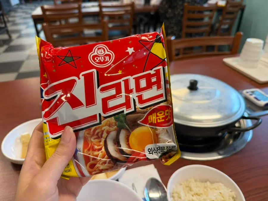 Budae jjigae pot with lid on and timer set