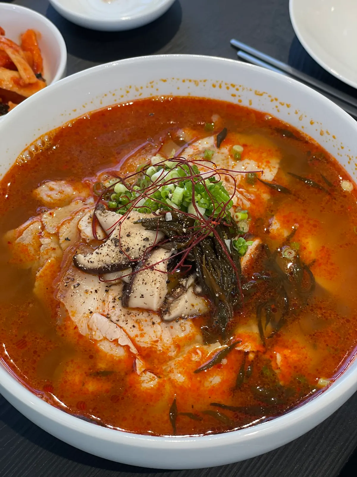 Close-up of the sharp, spicy gomtang broth