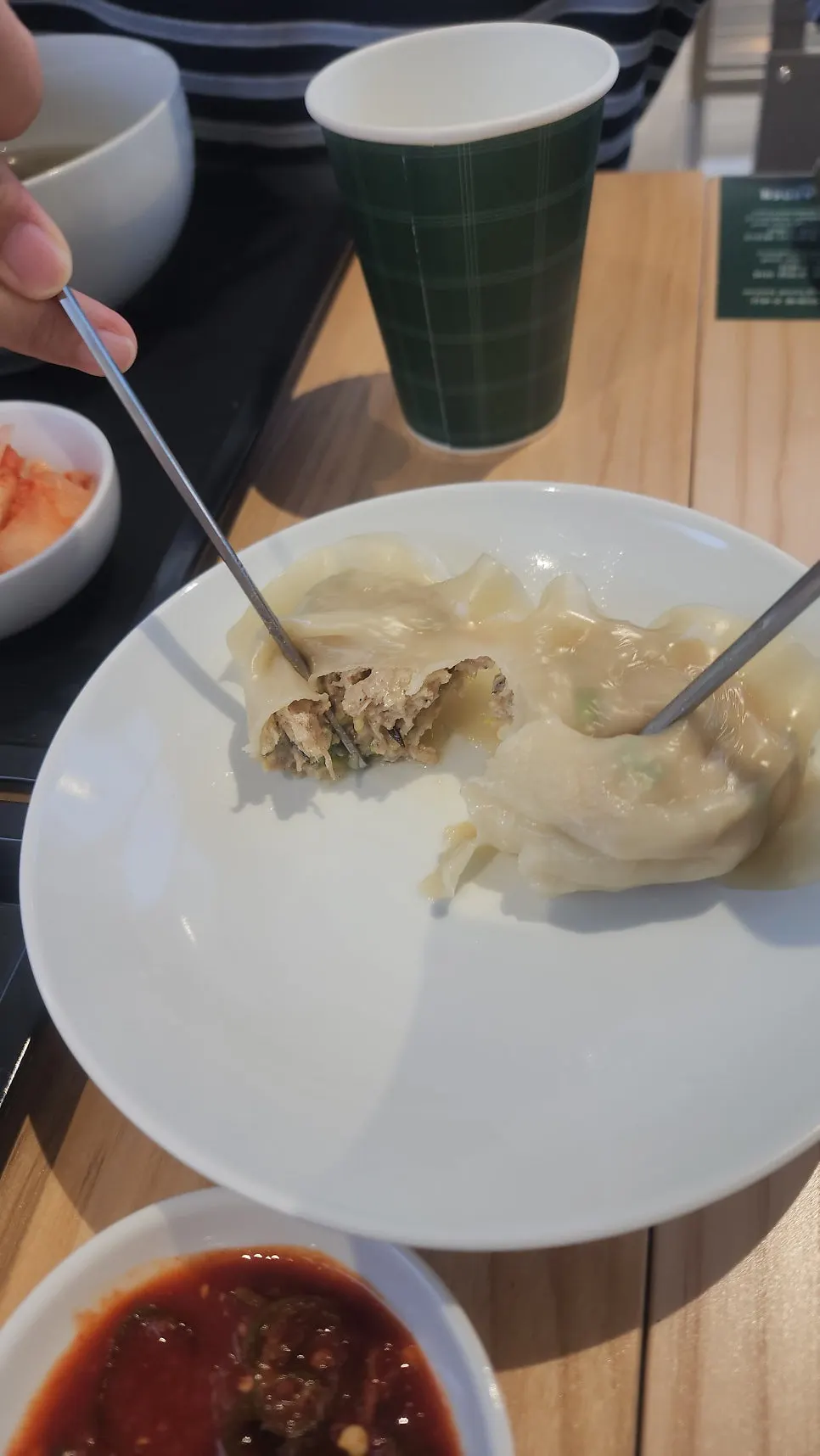 Minari tot king mandu cut open to reveal the juicy filling