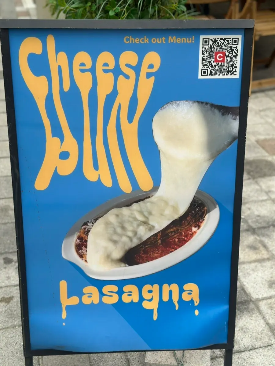 Menu board displayed outside the restaurant