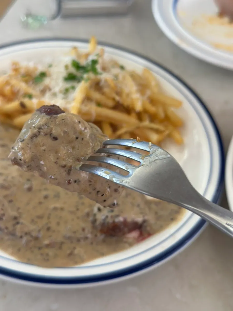 Full plate arrangement of the steak dish